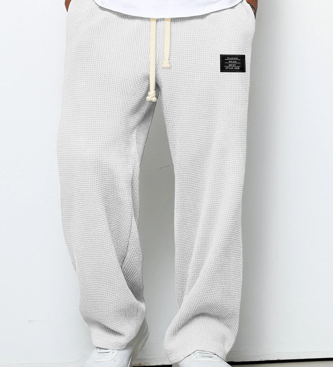 Samuel | Plati kelnės su reguliuojamu juosmeniu